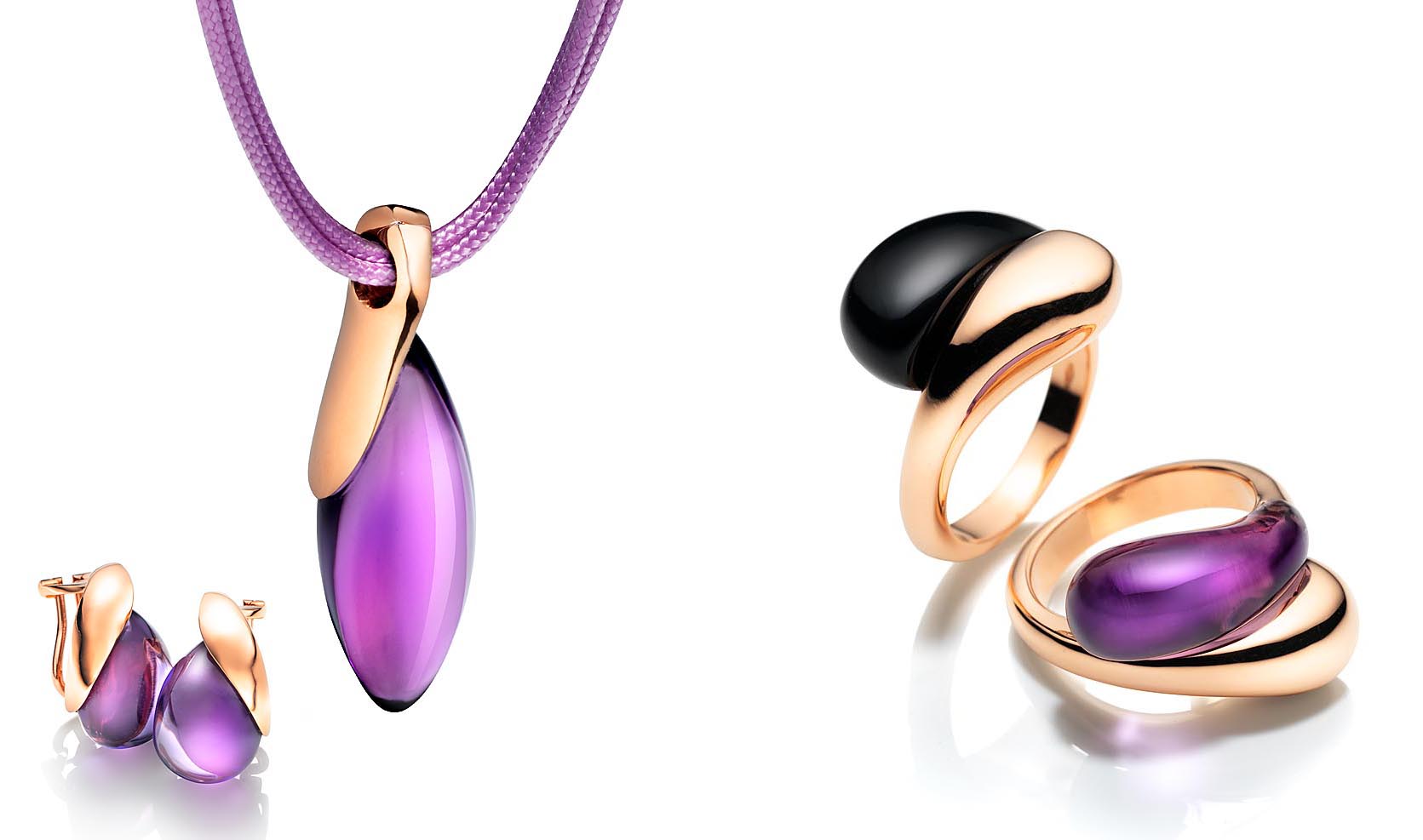 Schmuckset rotgold Farbsteine vor weißem Untergrund Werbefotografie und Retusche Kai Arndt München